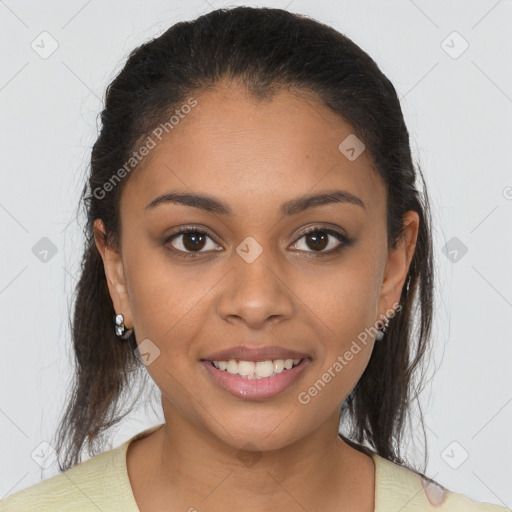 Joyful latino young-adult female with medium  brown hair and brown eyes