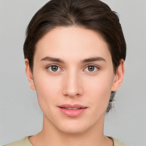 Neutral white young-adult female with medium  brown hair and brown eyes