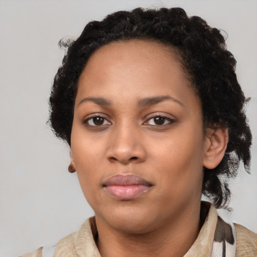 Neutral black young-adult female with long  black hair and brown eyes