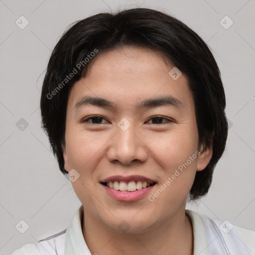 Joyful asian young-adult female with short  brown hair and brown eyes