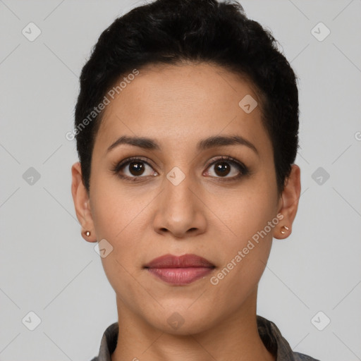 Joyful latino young-adult female with short  black hair and brown eyes