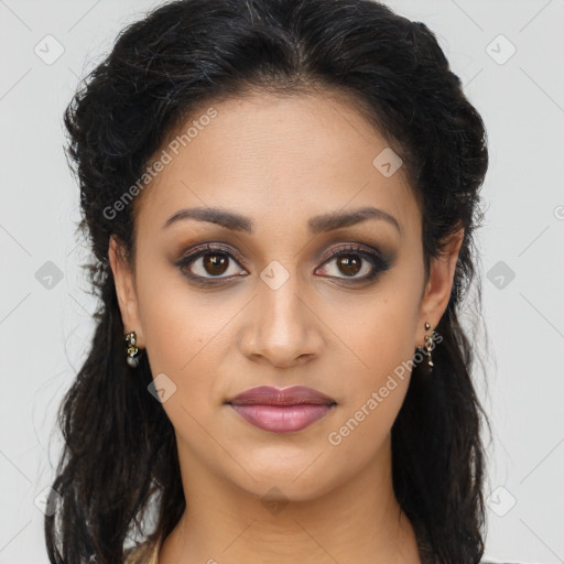 Joyful latino young-adult female with long  brown hair and brown eyes