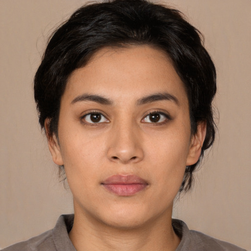 Neutral asian young-adult female with medium  brown hair and brown eyes