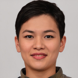 Joyful asian young-adult female with short  brown hair and brown eyes