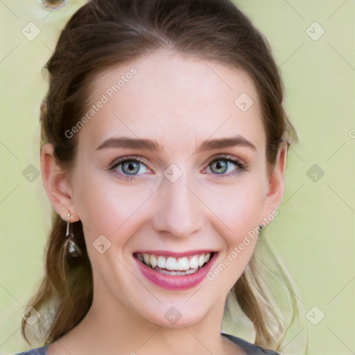 Joyful white young-adult female with long  brown hair and green eyes