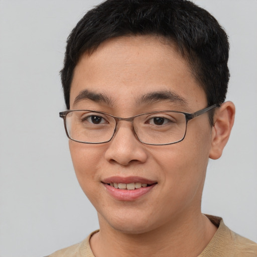 Joyful asian young-adult female with short  brown hair and brown eyes