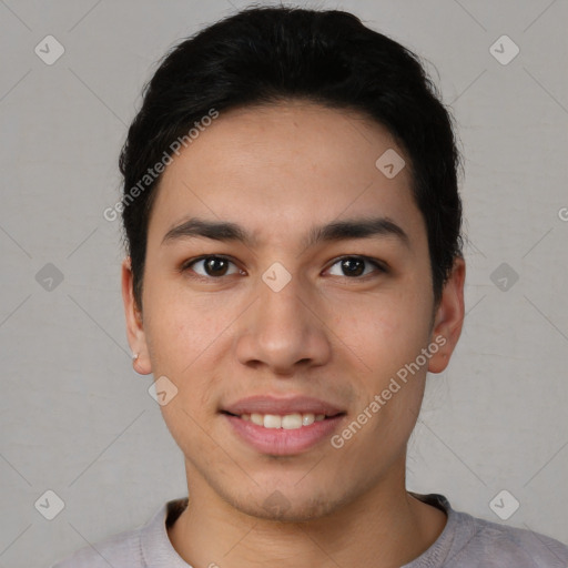 Joyful latino young-adult male with short  black hair and brown eyes