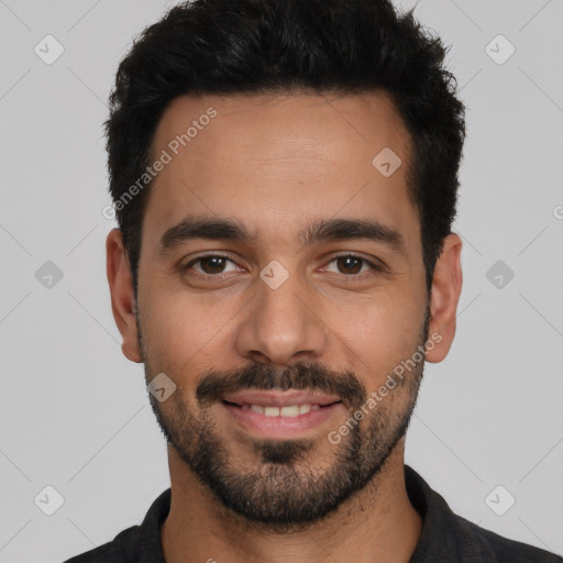 Joyful white young-adult male with short  black hair and brown eyes