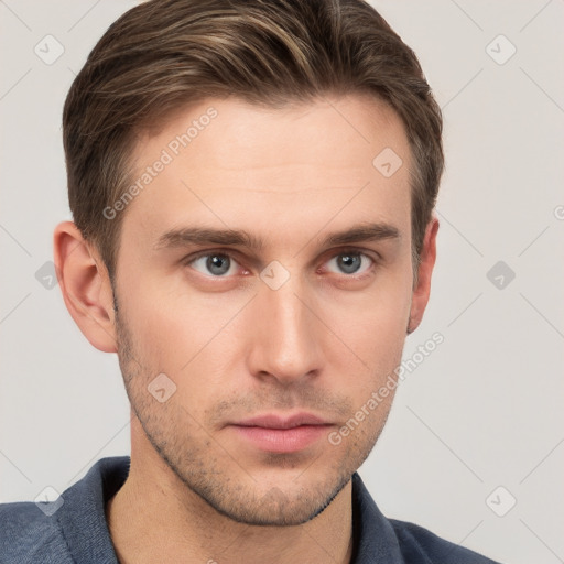 Neutral white young-adult male with short  brown hair and grey eyes