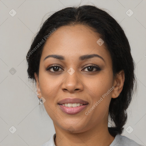 Joyful latino young-adult female with medium  brown hair and brown eyes