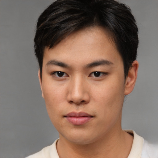 Neutral asian young-adult male with short  brown hair and brown eyes