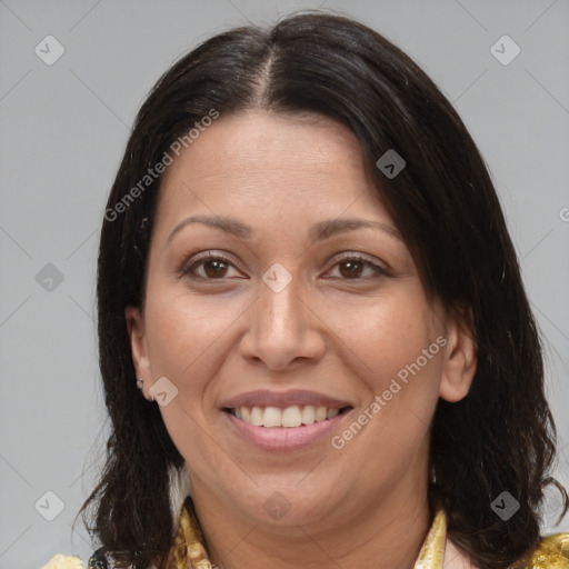 Joyful white adult female with medium  brown hair and brown eyes