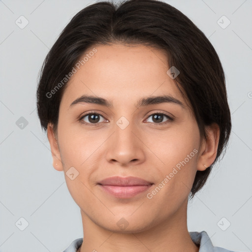 Joyful white young-adult female with short  brown hair and brown eyes