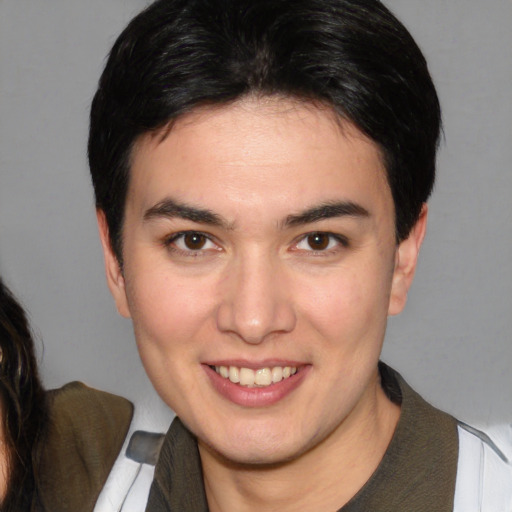 Joyful white young-adult male with medium  brown hair and brown eyes