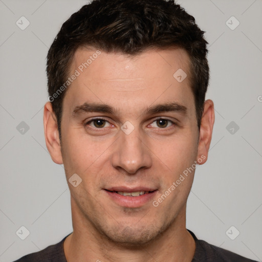 Joyful white young-adult male with short  brown hair and brown eyes