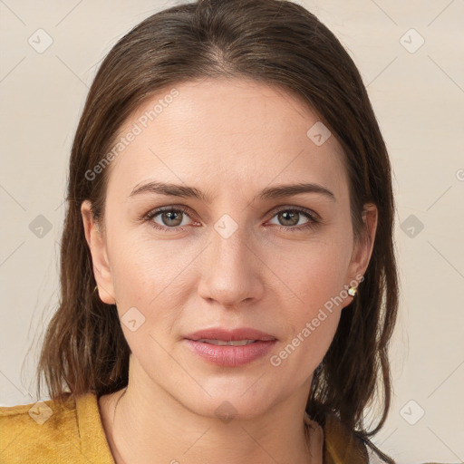 Joyful white young-adult female with medium  brown hair and brown eyes