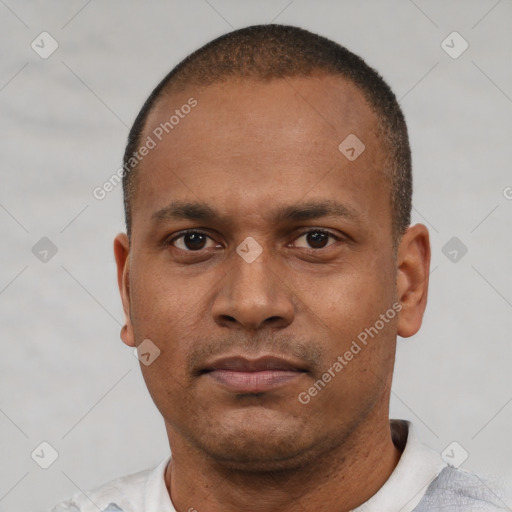 Neutral latino young-adult male with short  brown hair and brown eyes