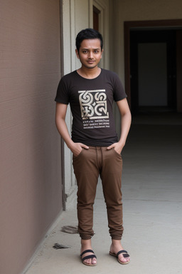 Nepalese adult non-binary with  brown hair