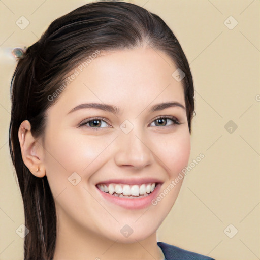 Joyful white young-adult female with long  brown hair and brown eyes