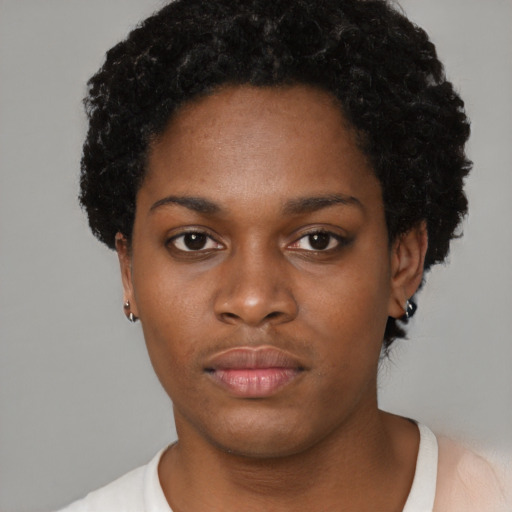 Neutral black young-adult female with short  black hair and brown eyes