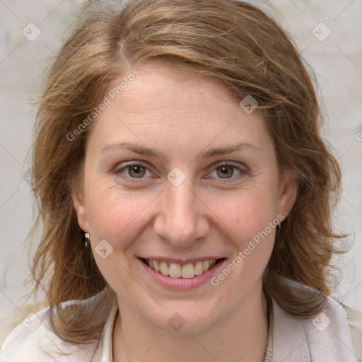 Joyful white young-adult female with medium  brown hair and blue eyes