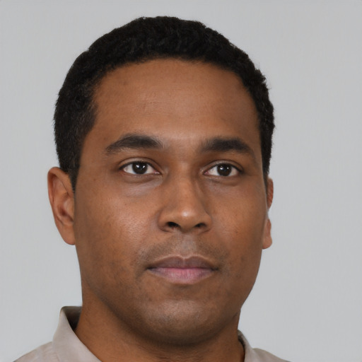 Neutral black young-adult male with short  black hair and brown eyes