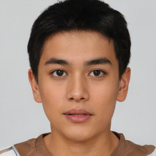 Neutral asian young-adult male with short  brown hair and brown eyes