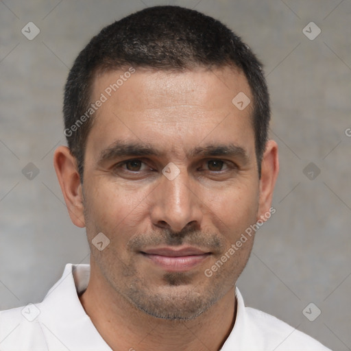 Joyful white adult male with short  brown hair and brown eyes