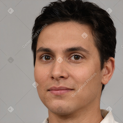 Joyful white young-adult male with short  brown hair and brown eyes