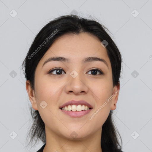 Joyful asian young-adult female with medium  black hair and brown eyes