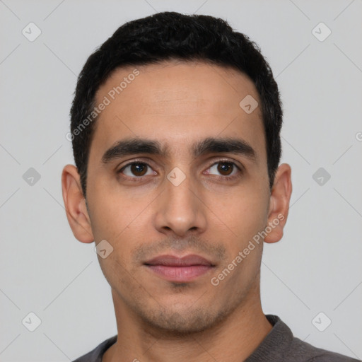 Neutral white young-adult male with short  black hair and brown eyes