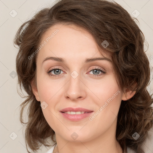 Joyful white young-adult female with medium  brown hair and green eyes