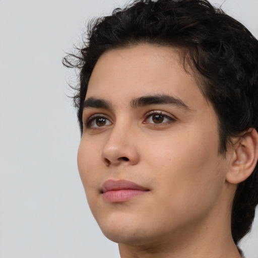Joyful white young-adult male with medium  brown hair and brown eyes