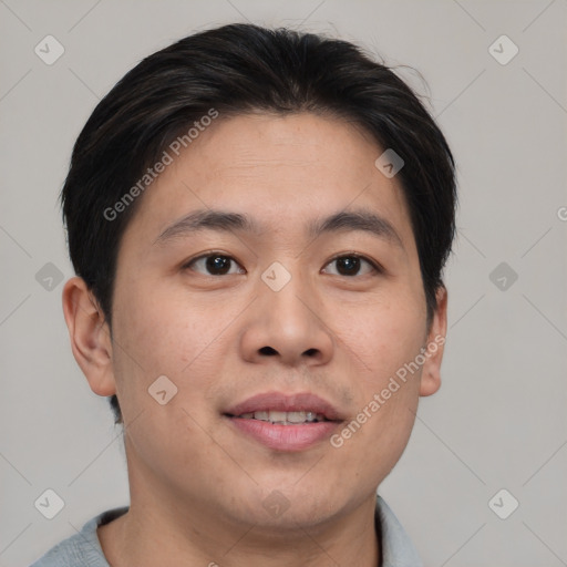 Joyful asian young-adult male with short  brown hair and brown eyes