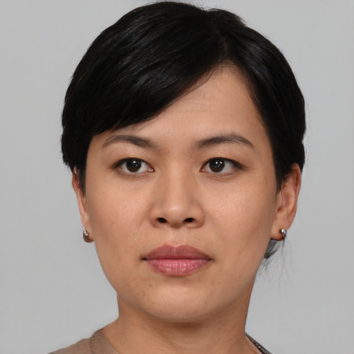Neutral asian young-adult female with short  black hair and brown eyes