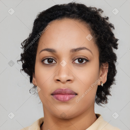 Joyful black young-adult female with long  brown hair and brown eyes