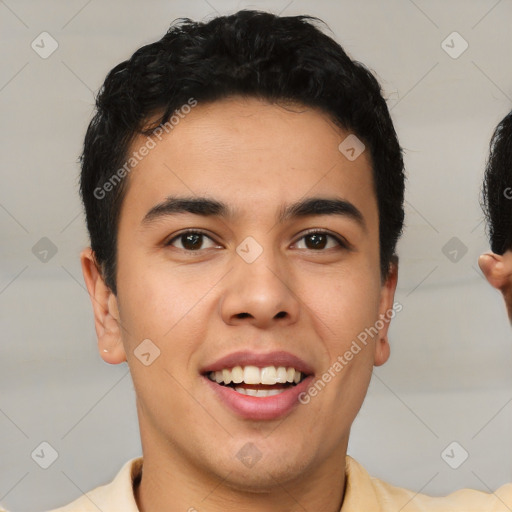 Joyful latino young-adult male with short  brown hair and brown eyes