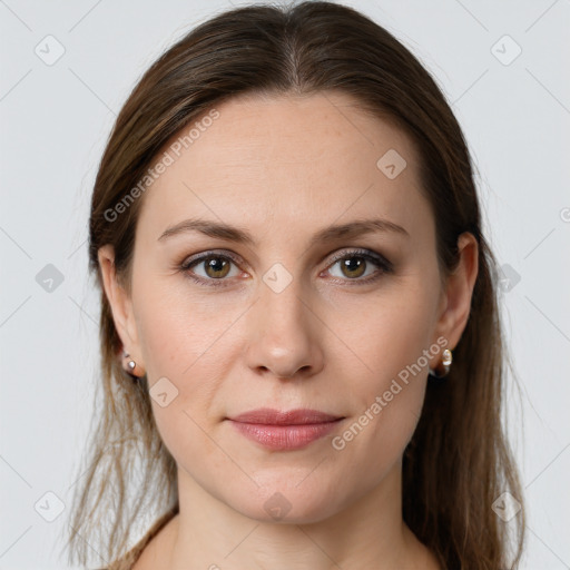 Joyful white young-adult female with long  brown hair and grey eyes