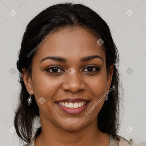 Joyful black young-adult female with medium  brown hair and brown eyes