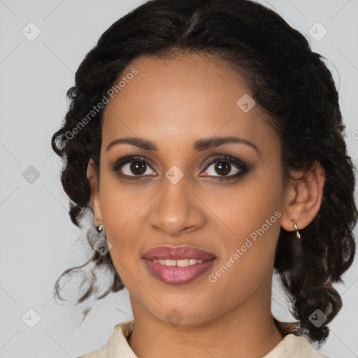 Joyful black young-adult female with medium  brown hair and brown eyes