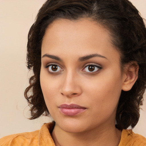 Neutral white young-adult female with long  brown hair and brown eyes