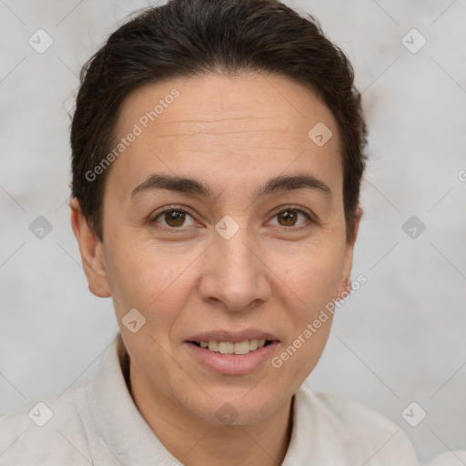 Joyful white adult female with short  brown hair and brown eyes