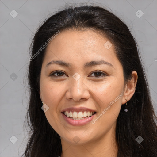 Joyful white young-adult female with long  brown hair and brown eyes