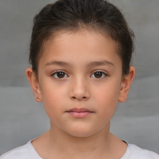 Neutral white child female with short  brown hair and brown eyes