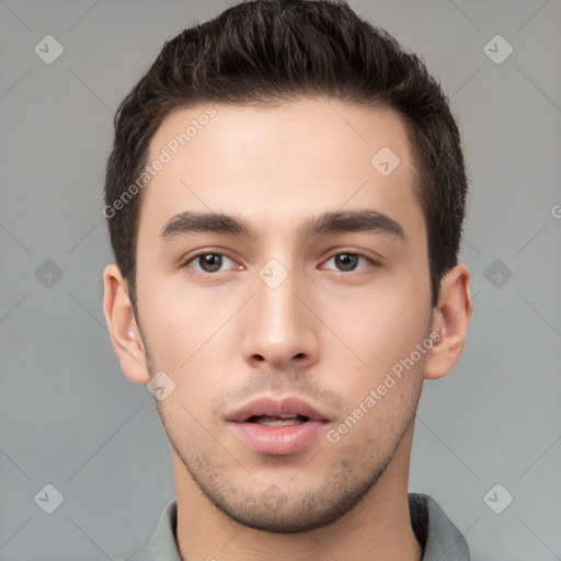 Neutral white young-adult male with short  brown hair and brown eyes