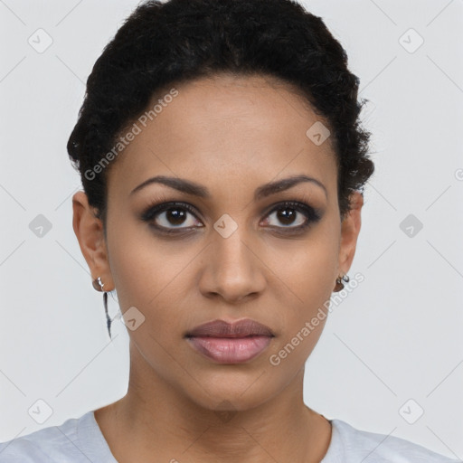 Joyful latino young-adult female with short  brown hair and brown eyes