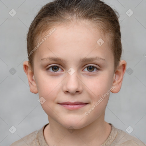 Joyful white child female with short  brown hair and grey eyes