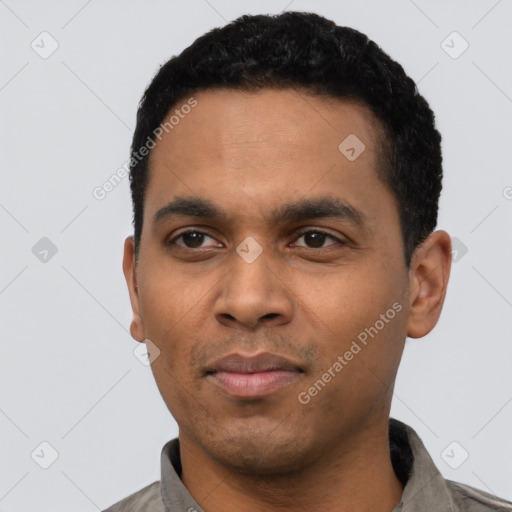 Neutral latino young-adult male with short  black hair and brown eyes