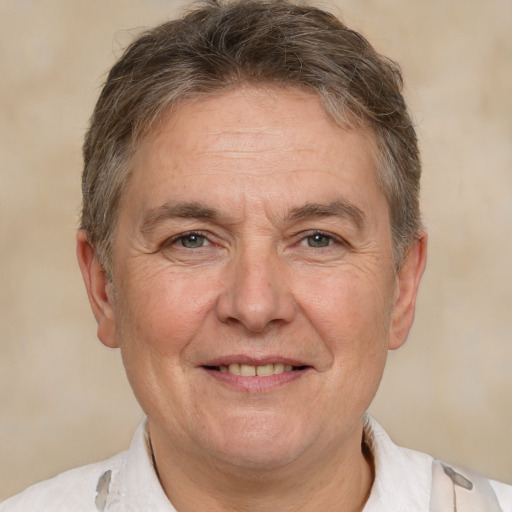 Joyful white middle-aged male with short  brown hair and brown eyes