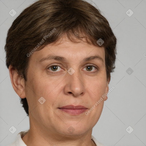 Joyful white adult female with short  brown hair and grey eyes